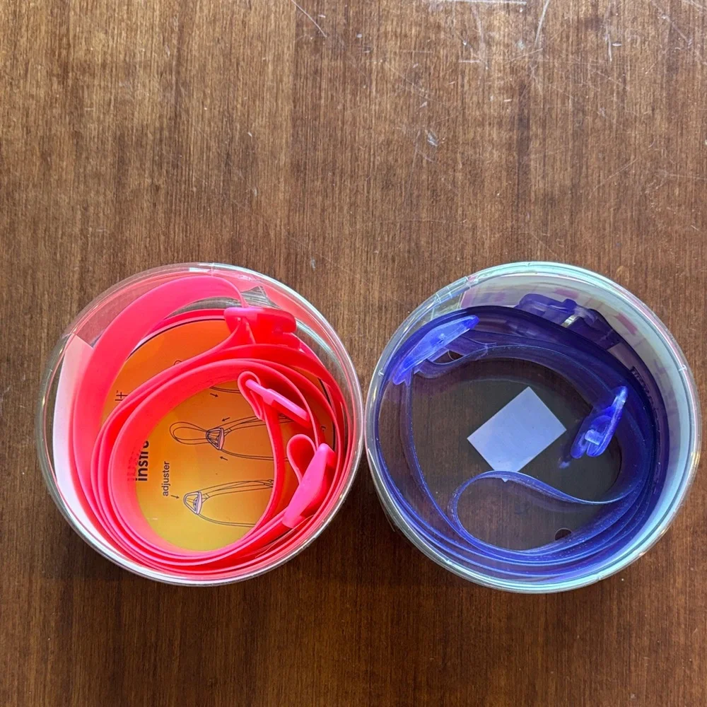 Set of Two (2) Invisibelt Girl No-Bulk Belts- neon pink and translucent purple.